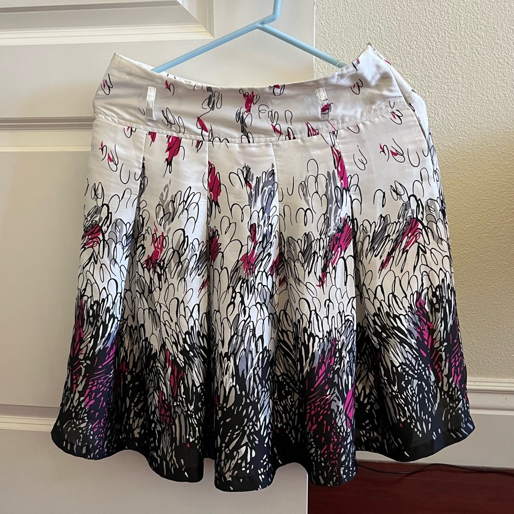 3 for $20 - White midi floral skirt with floral pattern.